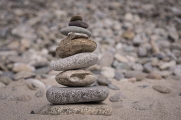 Fototapeta na wymiar stack of stones on beach