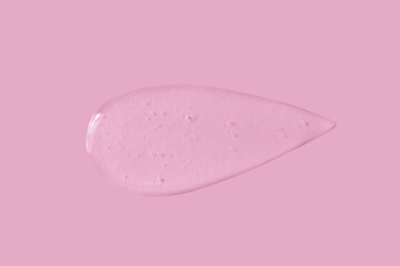 texture of a large smear of transparent gel on a pink background