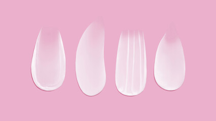 Set of cream texture smears on pink background
