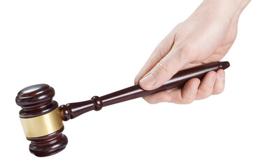 Hand with judge's gavel, cut out