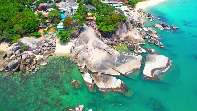 Hin Ta Hin Yai, also known as the Grandfather and Grandmother rocks, is a popular tourist attraction located on the southern coast of Koh Samui in Thailand. tropical and summer concept. 4K Drone
