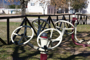 Gym equipment in the park for outdoor exercise. Concept of health and wellness