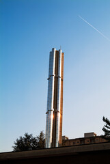 Chimney with group of pipes in polished steel