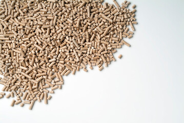 Scattered heating pellets on white tabletop