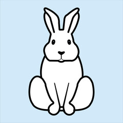 Fototapeta na wymiar A cute rabbit is sitting on the floor
