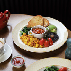 breakfast with fried eggs and vegetables