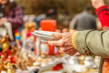 Close-up of a flea market scene in early spring outdoors