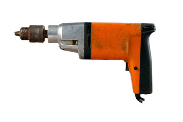 An old electric drill used in home workshops for minor repair work. Isolated background.