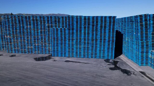 Stack Of Blue Pallets. Pallets For Transportation