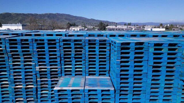 stack of blue pallets. pallets for transportation