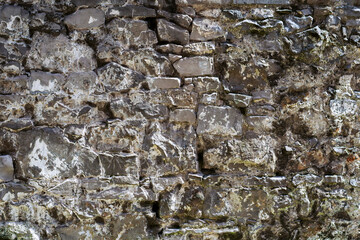 Old stone wall surface texture background.