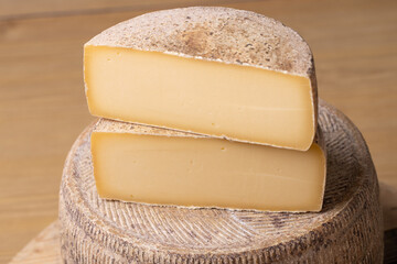 close up of maturated selection of cheese on old wood