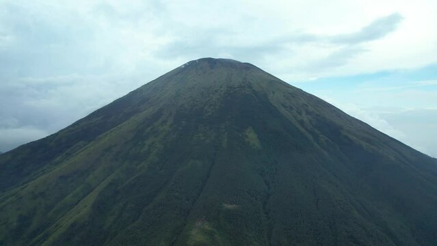 Aerial view of Mount Sindoro in Indonesia with noise cloud. With Selective focus. 