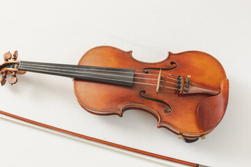 Fototapeta na wymiar Beautiful Violin Closeup on White Background, Classical, Bluegrass, or Celtic Instrument with Detail