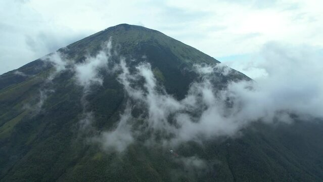 Aerial view of Mount Sindoro in Indonesia with noise cloud. With Selective focus. 