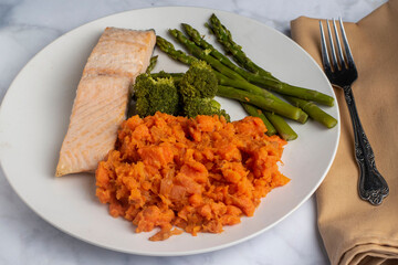 salmon fillet  with asparagus , broccoli and mashed carrots