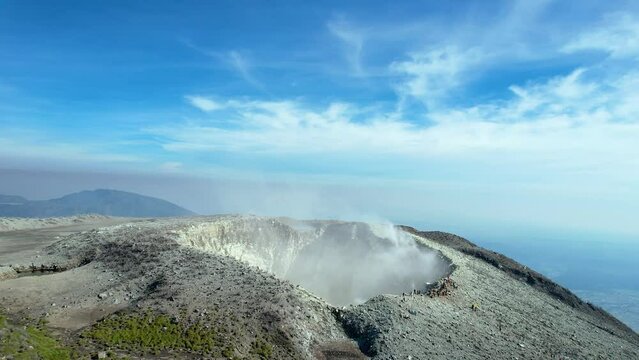 Seeing the inside of a volcano crater with smoke in east Java, Indonesia. 