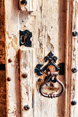 Medieval door with rusting fixtures