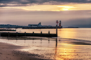 Obraz premium The pier and groyne at Bournemouth Beach, Dorset
