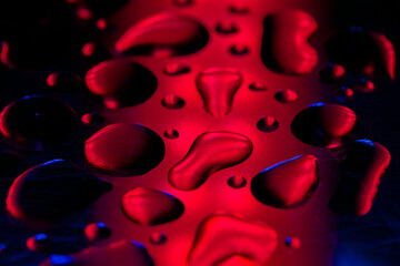 neon phone wallpaper.drops wallpaper Blue and pink colors.Bubbles in neon light.Fluid texture in...