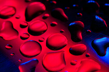 neon phone wallpaper.drops wallpaper Blue and pink colors.Bubbles in neon light.Fluid texture in...