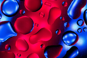 neon phone wallpaper.drops wallpaper Blue and pink colors.Bubbles in neon light.Fluid texture in...