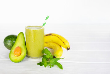 Avocado fresh cocktail smoothies fruit juice beverage healthy the taste yummy in glass drink episode good morning on white wooden background.
