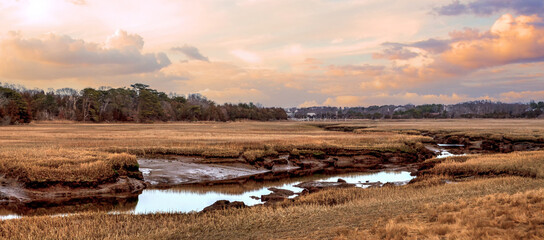 Sunset sky over the marsh and Sesuit Creek in East Dennis in winter