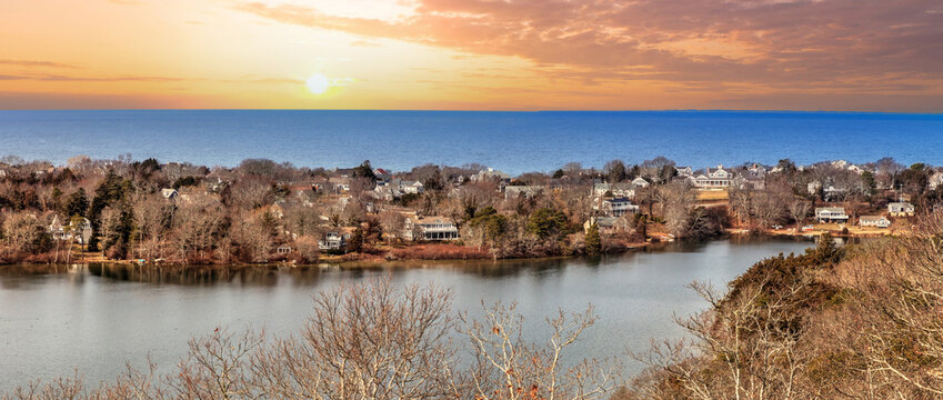 Skyline view of sunrise over Scargo lake and the ocean from the Scargo Tower in Dennis