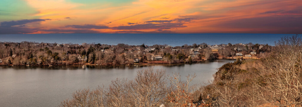 Skyline view of sunrise over Scargo lake and the ocean from the Scargo Tower in Dennis
