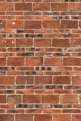 red brick wall at square format as background and texture vertical composition