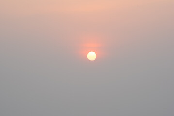 The red sun shines beautifully, Nature background.