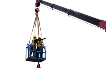Construction worker wearing safety harnesses in mobile crane bucket at construction site. working at heights above ground ,safety for working at heights concept
