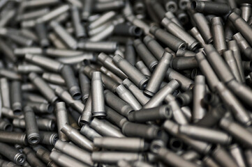 Bullet casings heap as background black and white effect