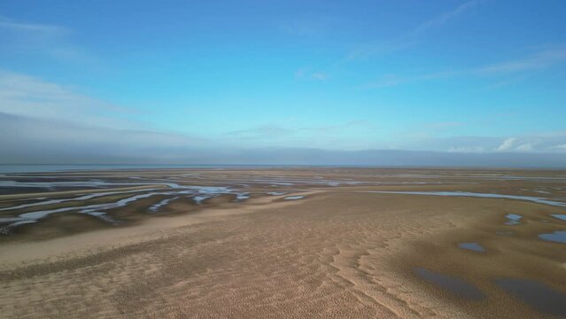 Flying over sand flats at National Coastwatch Initiative Rossall Point Fleetwood
