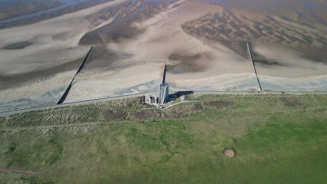 Reveal of sand flats at National Coastwatch Initiative Rossall Point Fleetwood