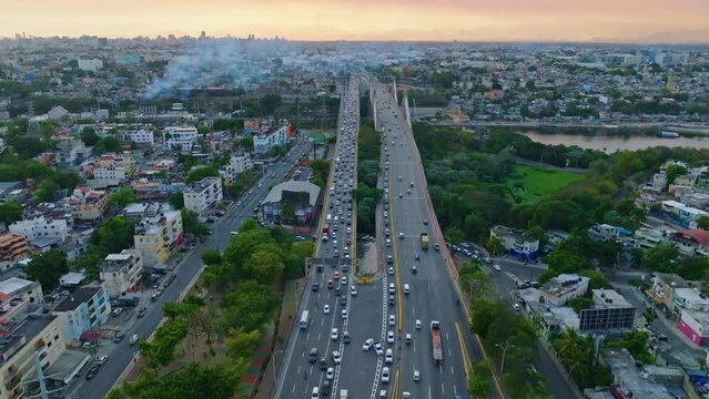 Aerial over Juan Bosch bridge and juan Pablo Duarte Bridge with cityscape