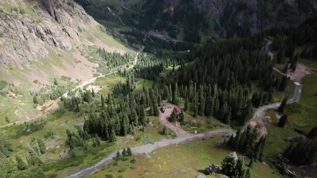 Governor Basin Camp Ground near Ouray, Colorado with Sneffels Mining District in the distance. Aerial 4K drone video in the Rocky Mountains.