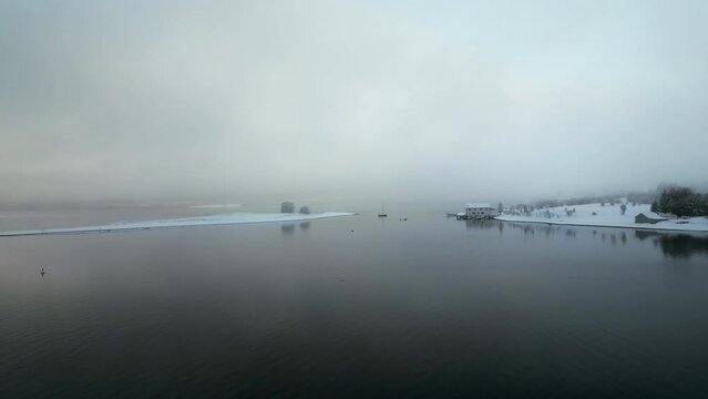 Norwegian Fjord on winter day, Kvaloya in Norway. Aerial birdseye and sky for copy space