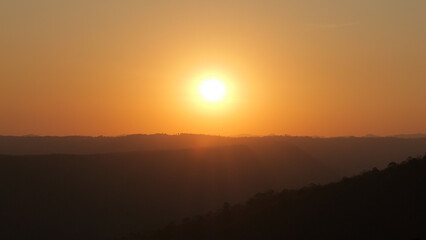 Fototapeta premium View of the sunset in the valley in the middle of nature.