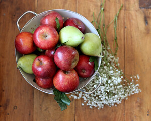 Beautiful shiny red apples on a table. Still life with organic fruit. Healthy eating concept. 
