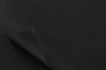 Page curl with shadow on blank sheet of paper.