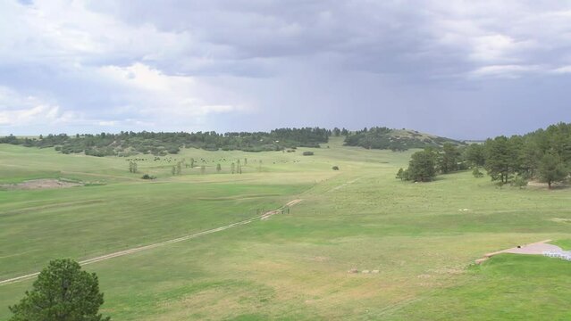 Black Forest Plains near in Colorado, with Thunderstorm in the distance, near Flying Horse Ranch. Aerial 4K drone video 