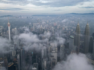 Morning foggy day at Bukit Bintang city skyscraper