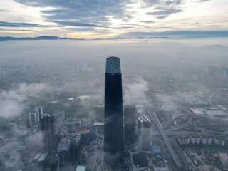 Drone view fog day at TRX Exchange 106 building in overcast morning
