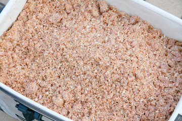 Bread crumb based krill mixed ground bait in the chum bucket for Japanese rock shore fishing