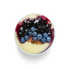 Bowl of tasty semolina porridge with blueberry jam on white background