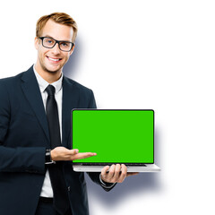 Business man in glasses spectacles, black suit show laptop with empty mockup green chroma key screen, isolated on white background. It expert,  technician repair service, tech support maintenance