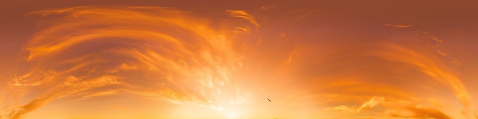 Glowing golden red sunset sky panorama. HDR 360 seamless spherical panorama. Full zenith or sky dome for 3D visualization, sky replacement for aerial drone panoramas.