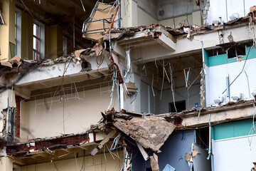 dismantled old building. Half demolished house, dismantling of the old one for the construction of a new building